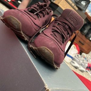 Women’s New Balance 574 Size 9 burgundy, and gold sneakers